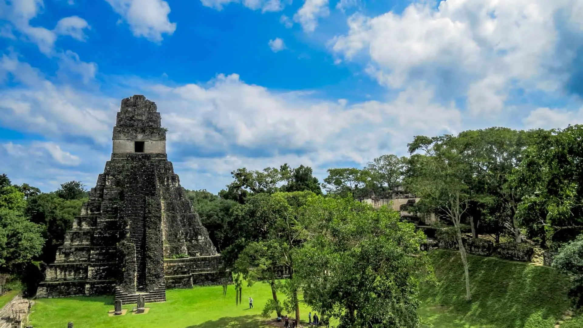 The Tikal main plaza with temple of the Great Jaguar as one of the Highlights of Guatemala Tour Package.