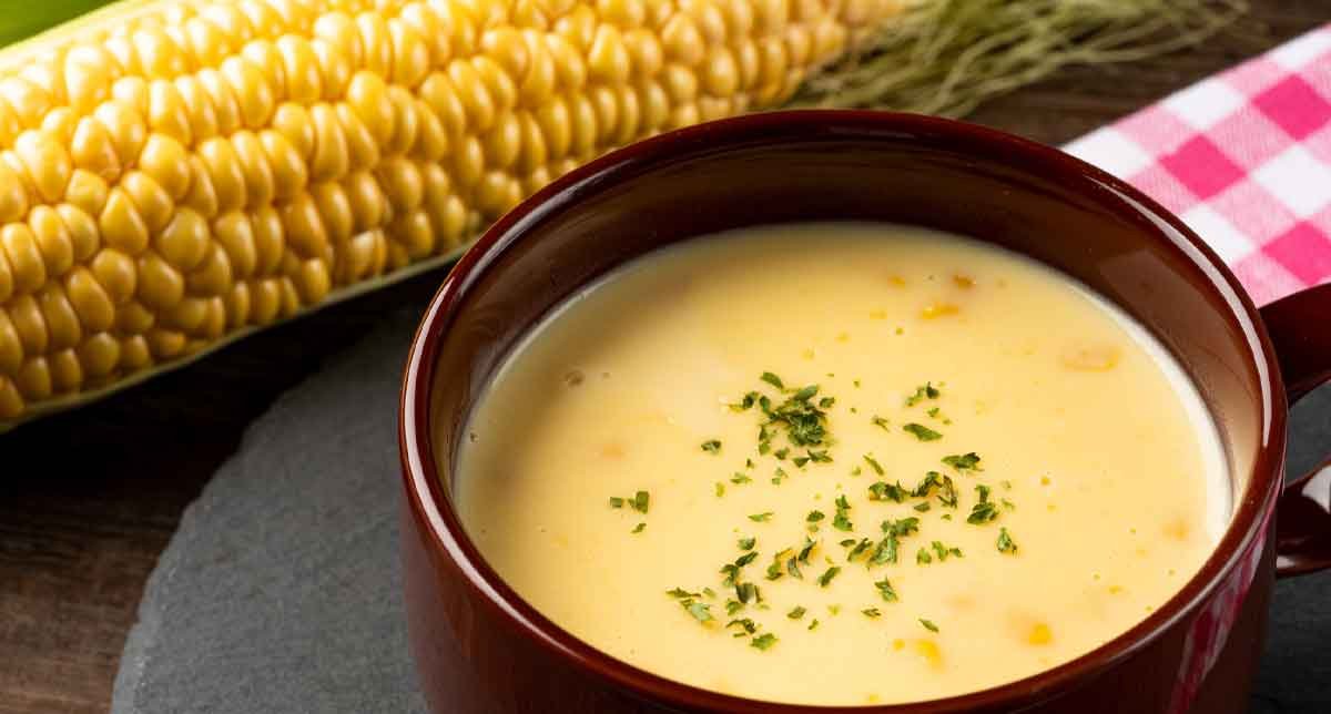 Sweet corn atol (atol de elote), a warm and creamy Guatemalan beverage made from fresh corn, milk, and cinnamon—perfect for cozy mornings or traditional celebrations. 
