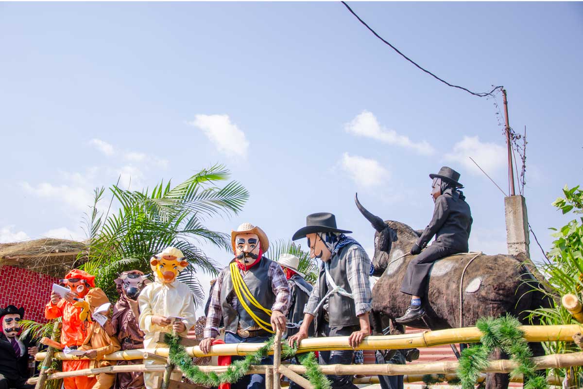 articipants in traditional dress at a Guatemalan fair during October cultural festivals in Central America, showcasing vibrant heritage and community spirit.
