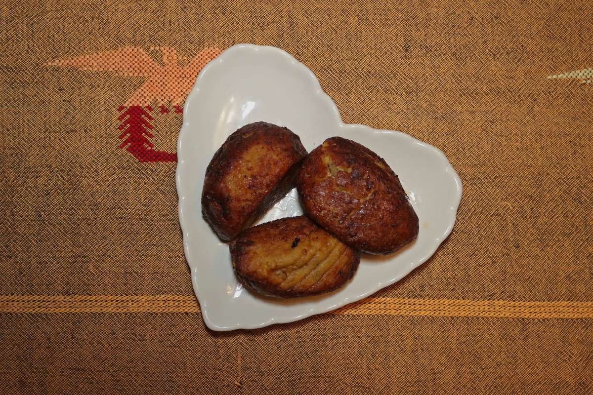 Rellenitos de Plátano, a traditional Guatemalan dessert made of sweet plantains stuffed with black bean paste and lightly fried to golden perfection