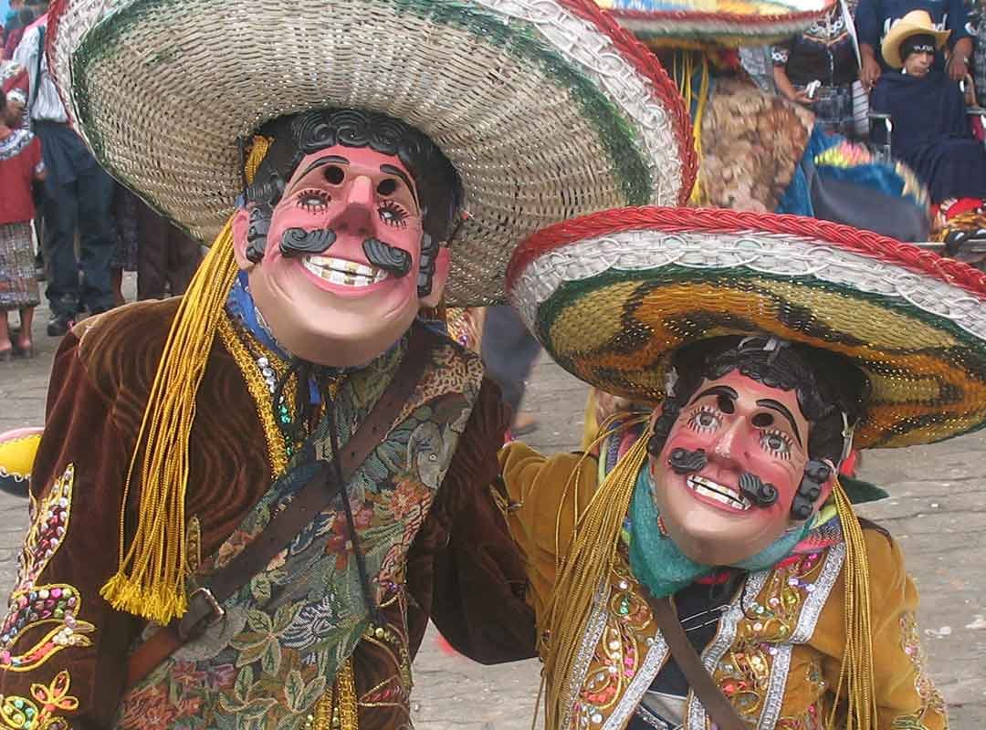 Losmexicanos | martsam Los Mexicanos dancers performing at the Chichicastenango Fair during a traditional convite parade in Guatemala.