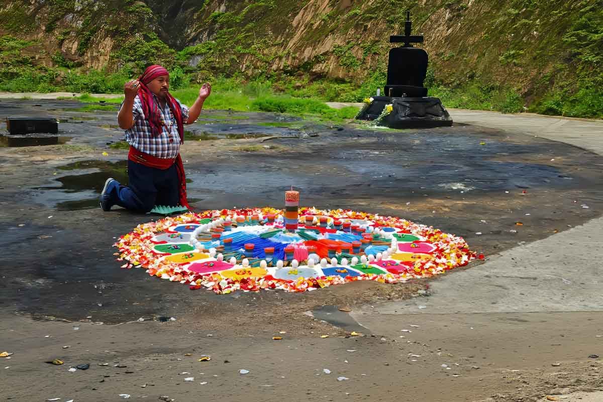Community altar with ceremonial offerings during a Maya ritual on private indigenous tours in Guatemala.