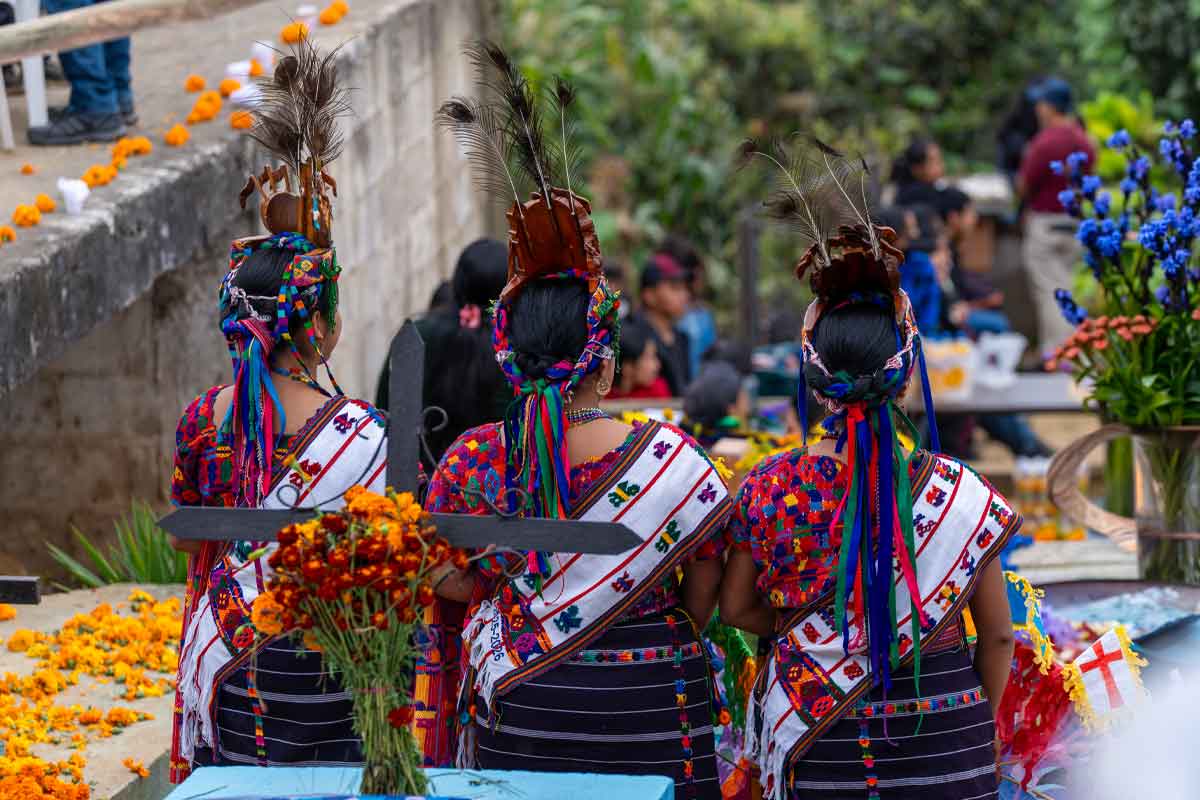 Maya women in traditional festival dress during private indigenous tours in Guatemala