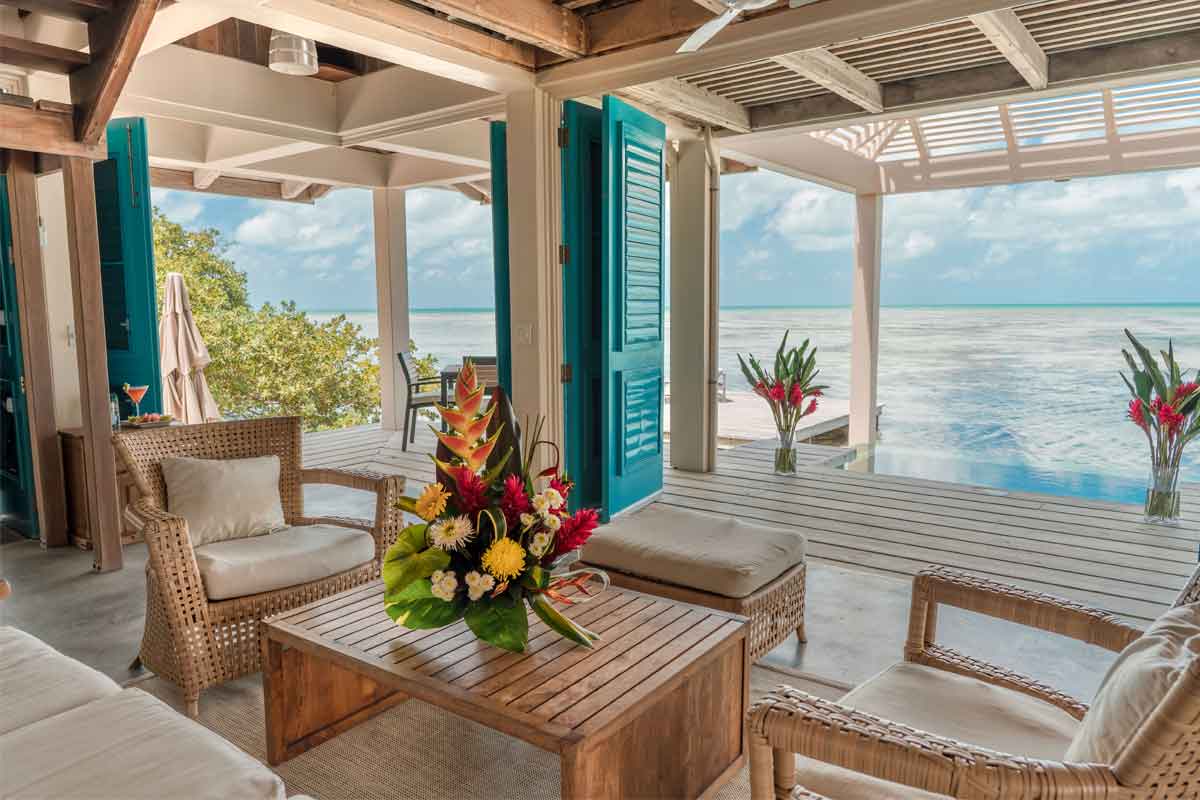 Over-water-bungalow | martsam travel Overwater villa in Belize for private Guatemala and Belize honeymoons with reef views and secluded Caribbean comfort.