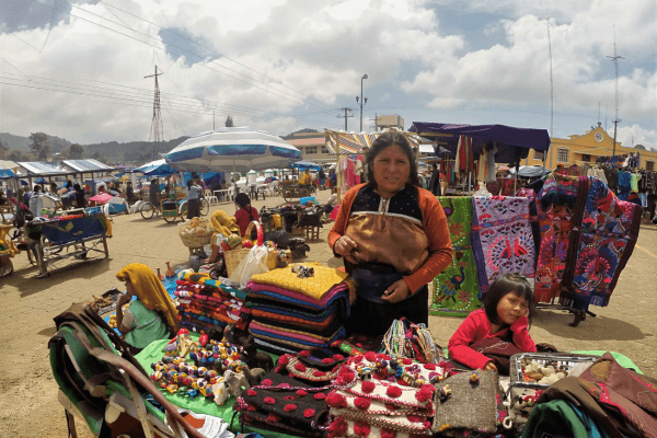 Mexico tour packages featuring Chiapas markets, local textiles, family travel, and living local traditions.
