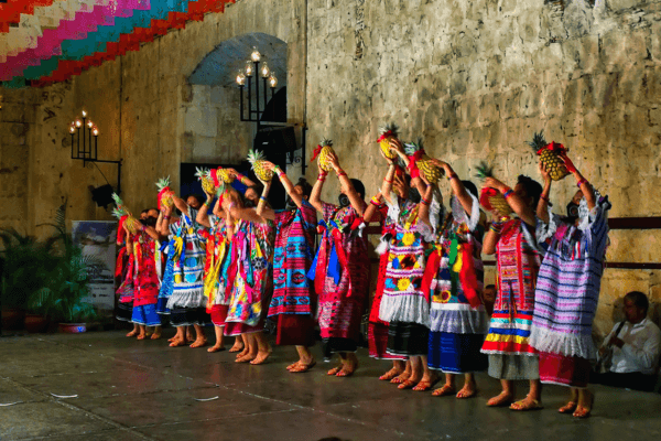 Mexico tour packages featuring traditional Oaxaca dance, local culture, food, markets, and private travel experiences.