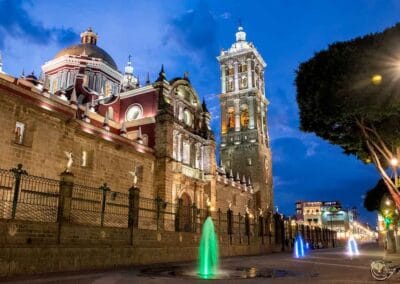 Illuminated Puebla Cathedral and historic center during the Mexico City to Oaxaca Private Tour
