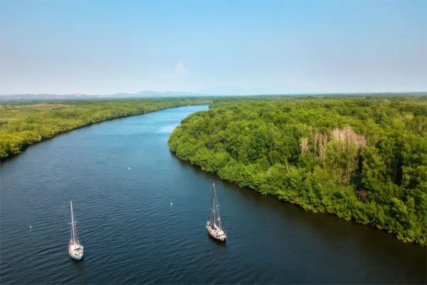 Bahia-de-jiquilisco-el-salvador | martsam travel Aerial view of mangrove waterways and sailboats in Bahía de Jiquilisco, El Salvador.