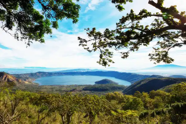 Santa-ana-volcano-lake-coatepeque-el-salvador | martsam travel Panoramic view of Lake Coatepeque surrounded by volcanic highlands in western El Salvador.