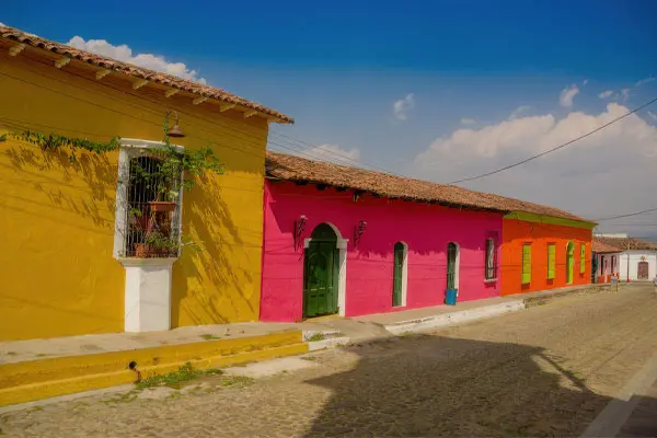 Suchitoto-el-salvador | martsam travel Colorful colonial houses along a cobblestone street in Suchitoto, El Salvador.